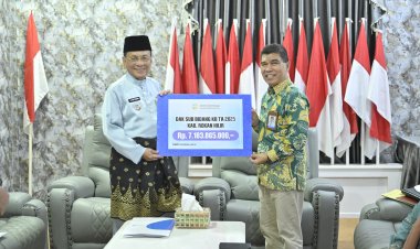 Rp. 7,18 M dari BKKBN Provinsi Riau, Bupati Rohil Terima Pagu DAK Sub Bidang KB Secara Simbolis
